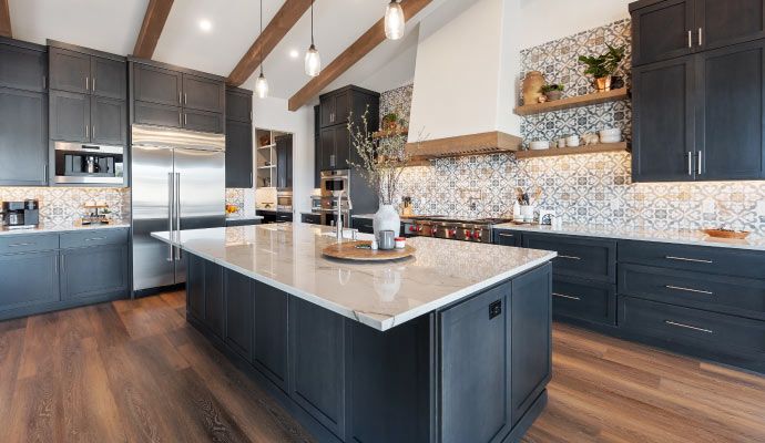 Modern kitchen interior with freshly refinished and painted cabinets